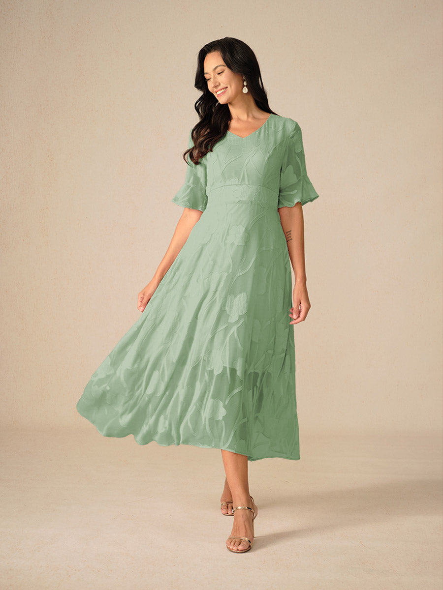 Couture-moda | Elegant Maxi Dress with Flutter Sleeves and Lace Detailing - Image 14
